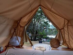 Luxury eco friendly safari tented camp suite in private Maasai Mara conservancy Kenya